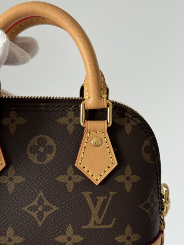 LOUIS VUITTON Alma Monogram Canvas Bag - Image 5