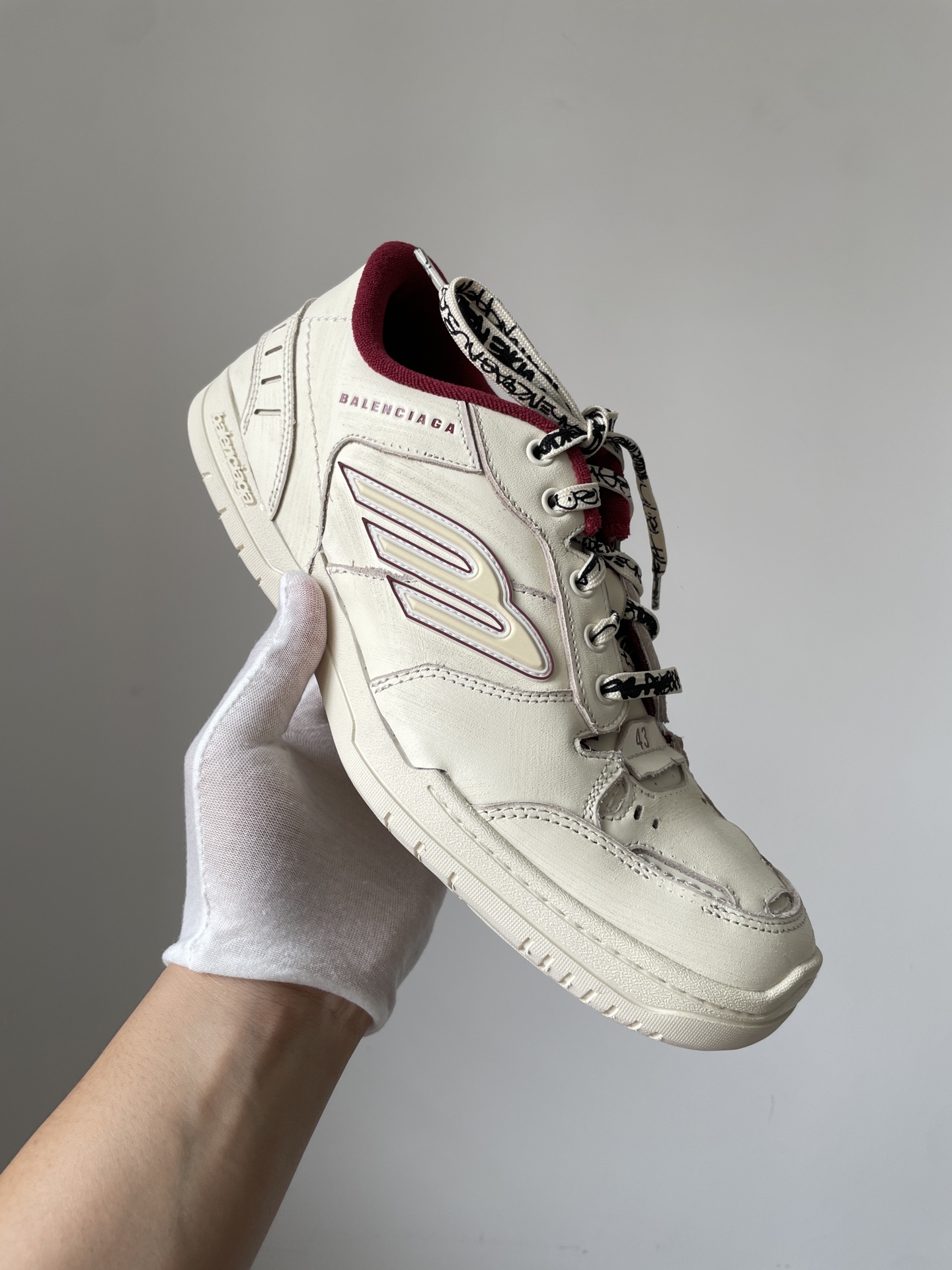 Balenciaga Hamptons Worn-Out Round-Toe Lace-Up Low-Top Distressed White Sneakers - Image 2